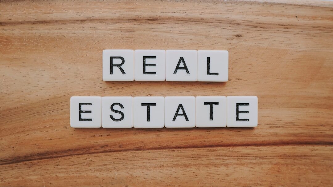 Group portrait of four South American real estate agents in smart casual attire